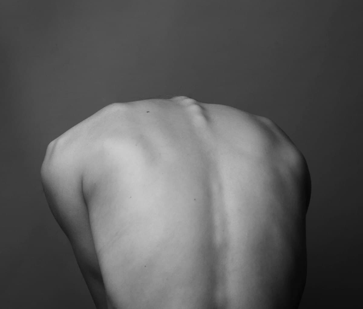 Close-up of a human back showing the contour of the spine